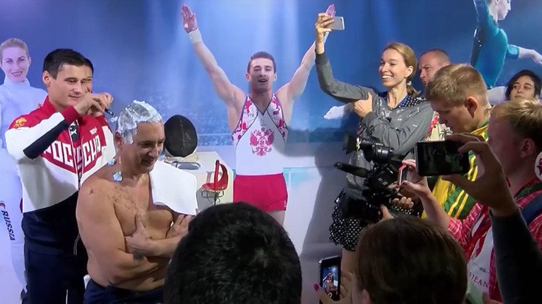 Russian fencing team shaves coach’s head clean after scoring 7 medals in Rio (VIDEO)