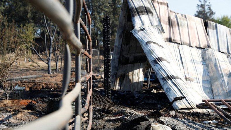 California arsonist arrested as thousands flee devastating Clayton wildfire