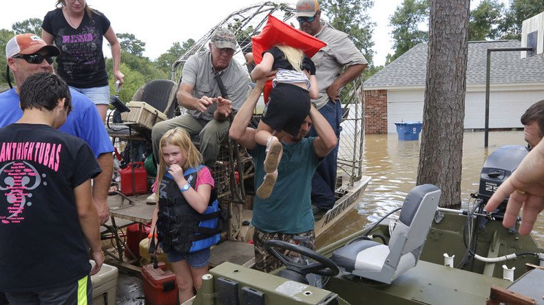 Trump visits Louisiana amid worst flooding since Superstorm Sandy