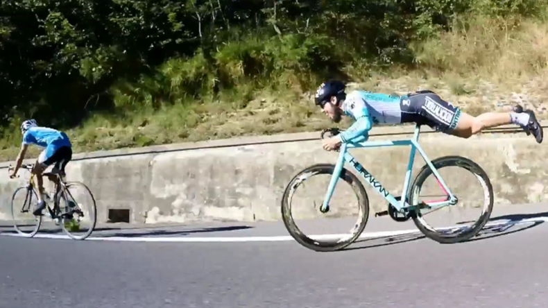 Wheel deal: Cyclist channels inner Superman to destroy rivals (VIDEO ...
