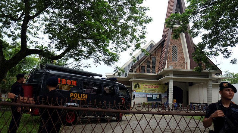 Teen attacks priest with ax, attempts to detonate bomb in crowded Indonesian church