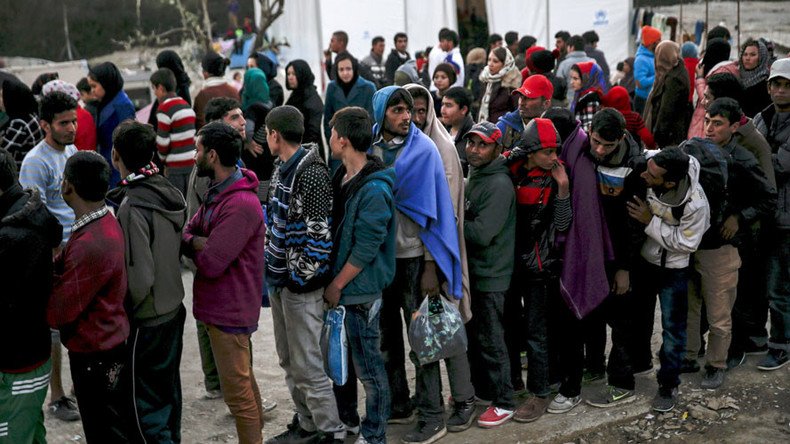 More than 300,000 refugees in Germany work illegally, pay kickbacks to asylum center staff - reports