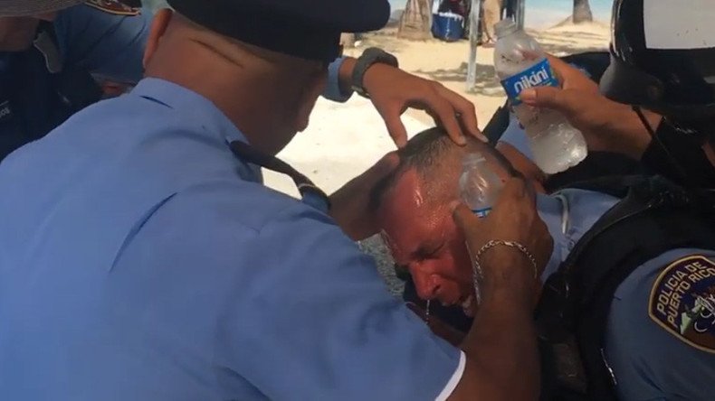 Cop pepper-sprayed by protester during Puerto Rico austerity conference (VIDEO)