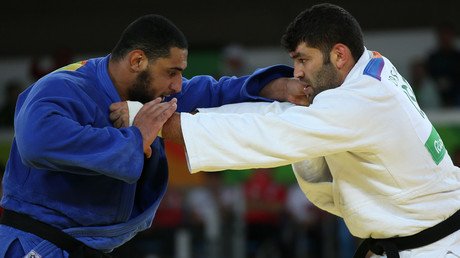 Iran wrestler banned for throwing match to avoid Israeli matchup