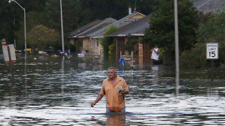 Trump visits Louisiana amid worst flooding since Superstorm Sandy