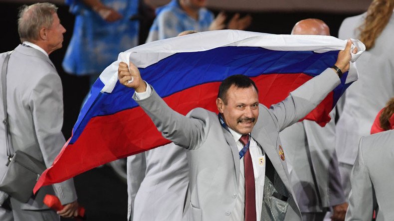 IPC revokes Paralympic accreditation of Belarus official who carried Russian flag