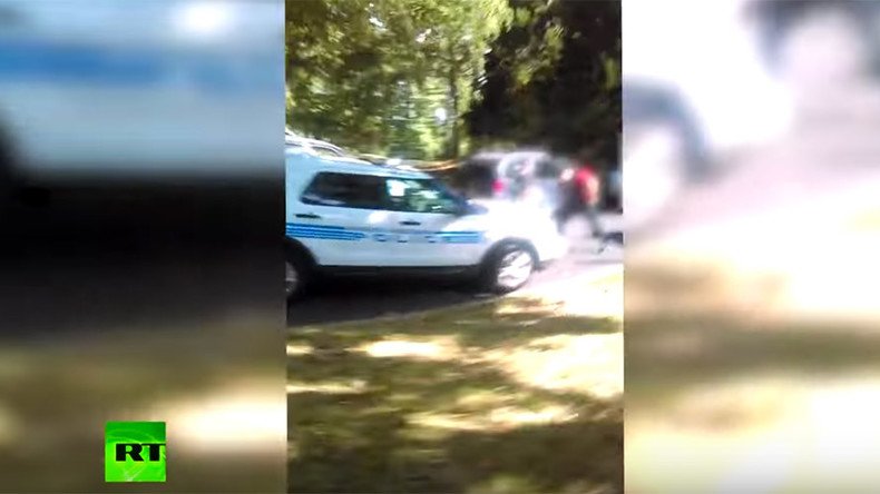 'He doesn't have a gun!' Keith Scott's wife releases footage of fatal shooting (VIDEO)