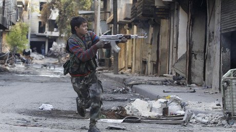 Child soldiers: Iraqi govt militia recruits displaced minors to fight ISIS, HRW report says  
