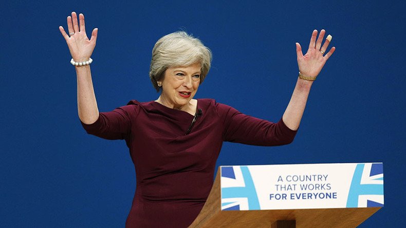 Tories are ‘party of the workers,’ says Theresa May... while wearing £800 outfit