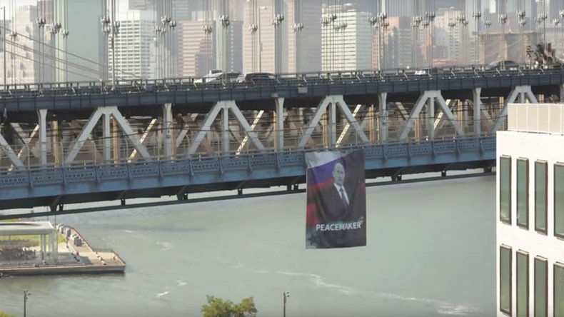 ‘Peacemaker’ Putin’s portrait flies on Manhattan Bridge, creates a stir among New Yorkers