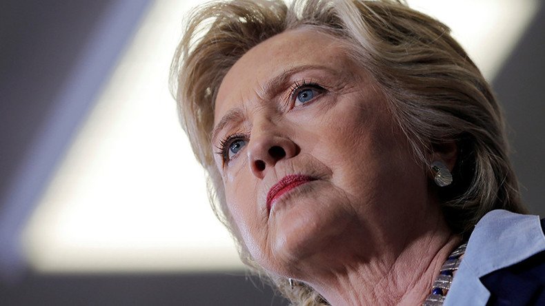 'Clinton campaign blames Russian hackers as Assange promises more leaks'