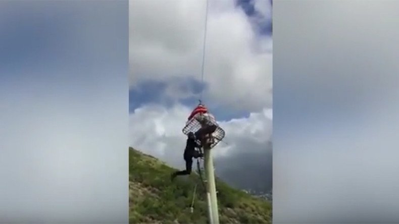 Firefighter plunges 30 feet as helicopter rescue effort strikes electricity pole (VIDEO)