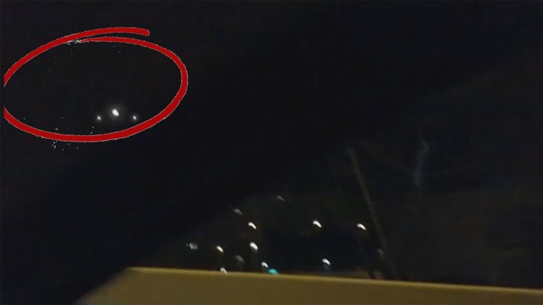 ‘Completely crazy’: Freaky UFO lights up Geneva, stuns onlookers (VIDEO)