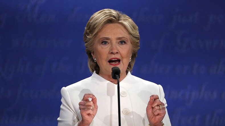 Clinton shifts debate away from WikiLeaks revelations by blaming Putin for cyberattacks