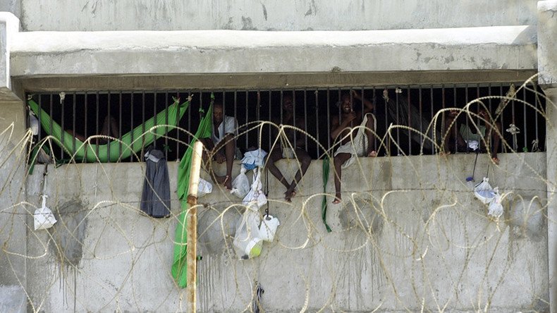 Big prison break: 174 inmates kill guard, steal guns, flee Haiti prison