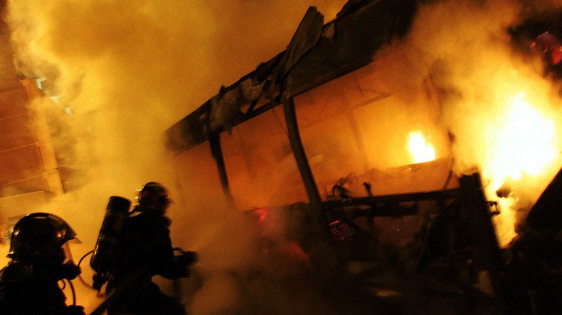 Masked perpetrators set bus on fire in Paris suburb