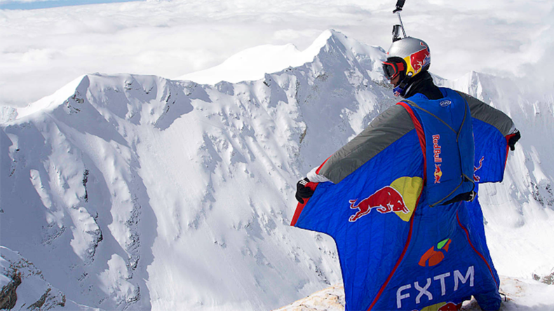 Russian smashes base jumping record with Tibetan mountain leap (VIDEO)