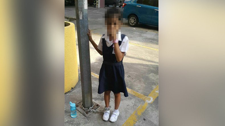 Mother chains daughter to a pole for refusing to go to school (PHOTOS)
