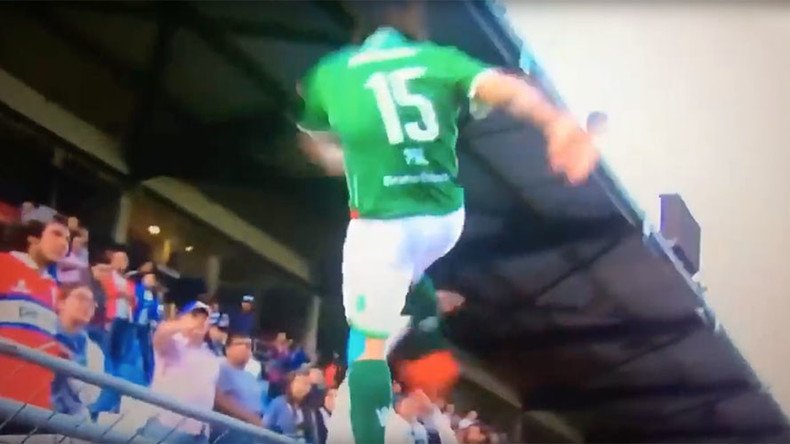 Furious footballer faces jail after attack on rival fan in South America (VIDEO)