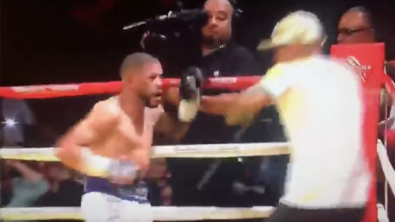 Hot-headed boxer batters opponent then brawls with his trainer (VIDEO)
