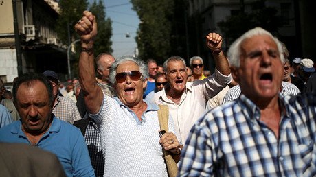 Greek pensioners rock police bus at Athens protest, tear-gassed in return (PHOTOS, VIDEOS)