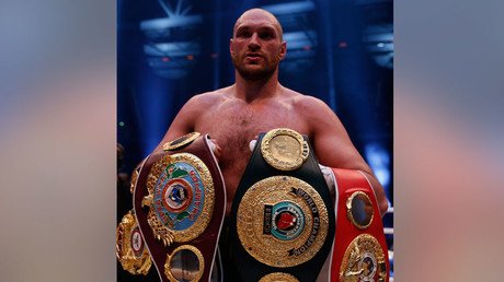 Tyson Fury voluntarily gives up world titles