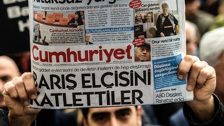 Turkish police arrest editor-in-chief of Cumhuriyet opposition daily, raid executives’ homes