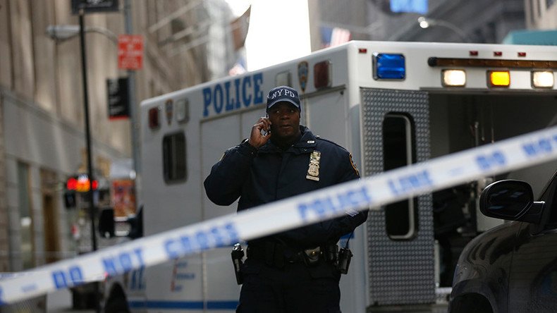 One NYPD officer dead, another wounded in robbery shootout