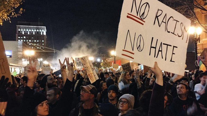 Vandalized cars, smashed windows: Anti-Trump protest in Portland ...