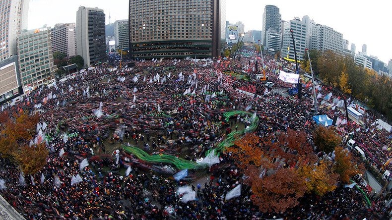 100,000s stage largest-ever protest in Seoul to demand president resign