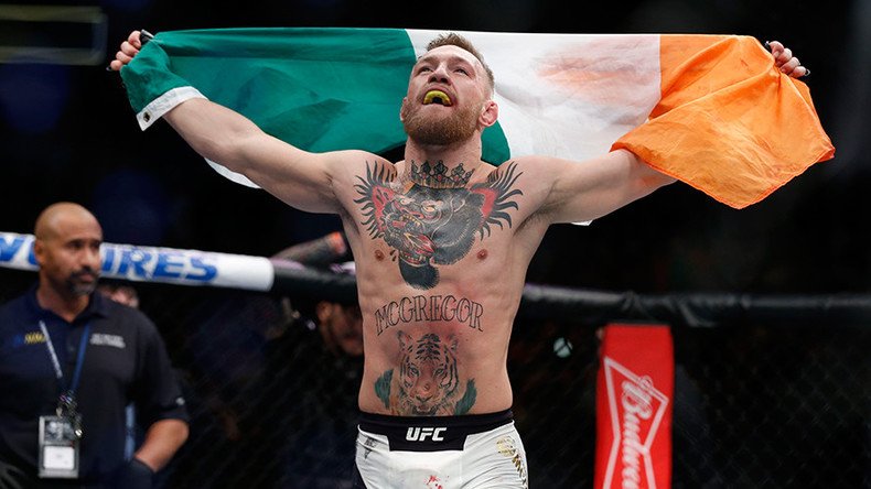 McGregor beats Alvarez to become first ever simultaneous two-weight UFC champion
