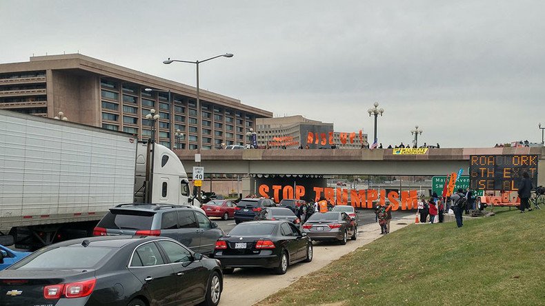 Anti-Trump, anti-TPP protesters block DC highway 