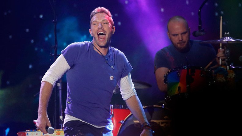 'British are back to insult our nation': Coldplay accused of disrespecting Indian flag during gig