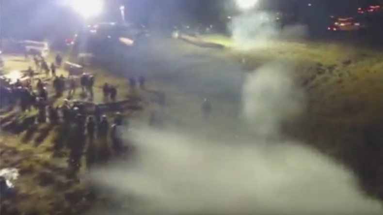 Drone narrowly escapes water cannon jet during DAPL protest (VIDEO)