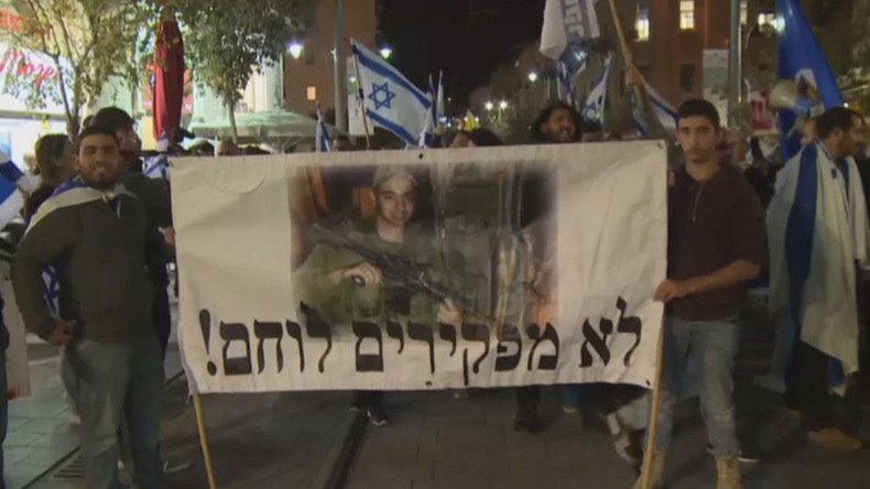 ‘Free him now!’ Protesters demand release of Israeli prisoner charged with killing Palestinian