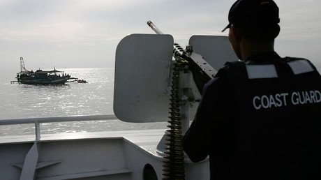 Philippine coast guard enters disputed shoal, China doesn’t object