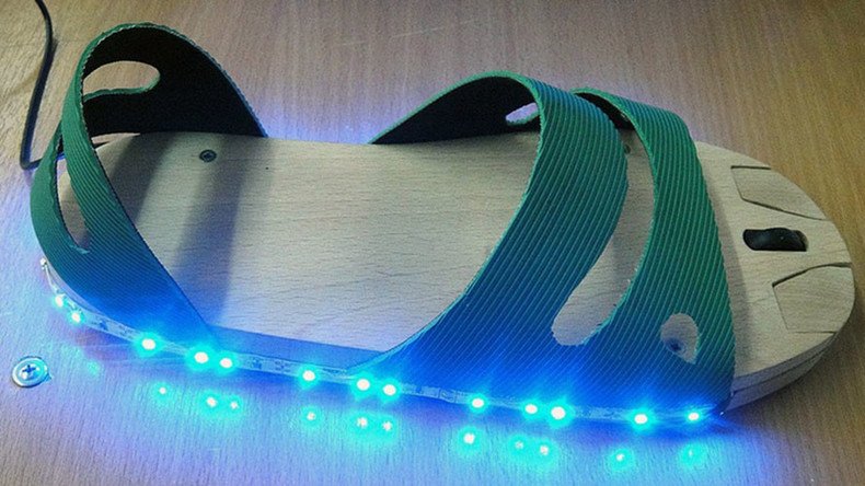 Russian teen invents LED ‘mouse-sandal’ for people who have no hands 