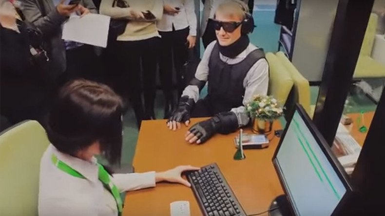 Russian bank chief causes Twitter frenzy after showing up to check service in ‘disabled costume’ 