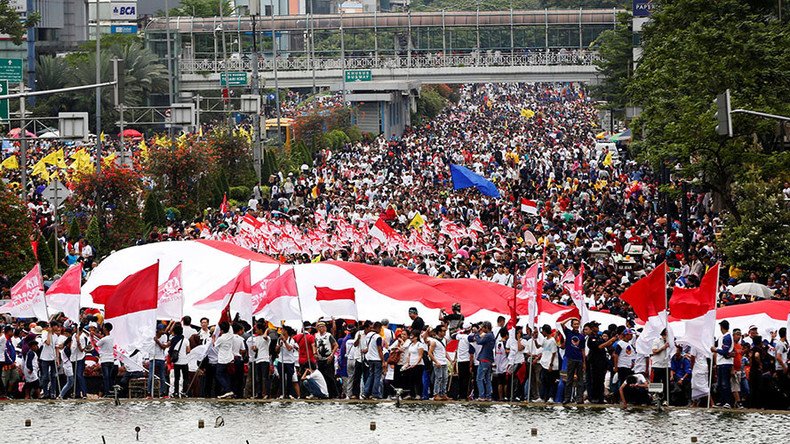 Tens of thousands march in Indonesia to support first Christian governor after ‘blasphemy’ protests