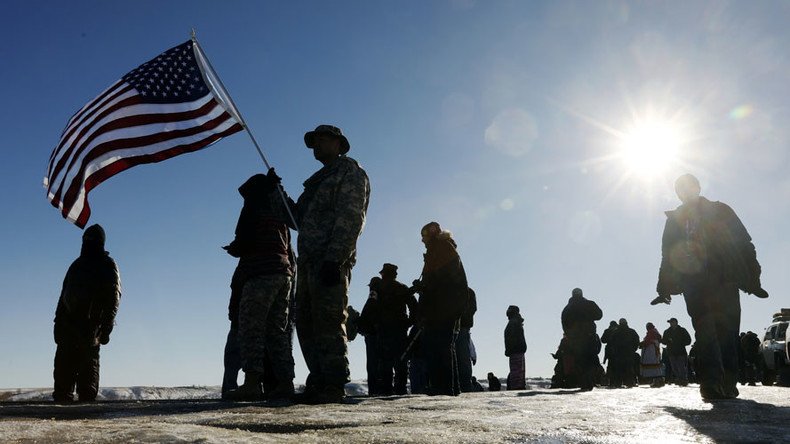 After Dakota Access Pipeline victory, veterans headed to Flint