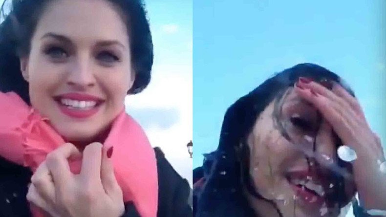 Wave almost sweeps woman out to sea as she films storm in Sochi (VIDEO)
