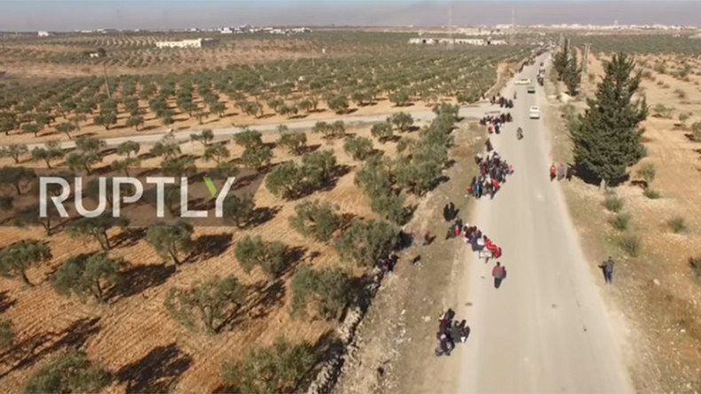 Drone footage shows civilians fleeing from militant-held E. Aleppo (VIDEO)