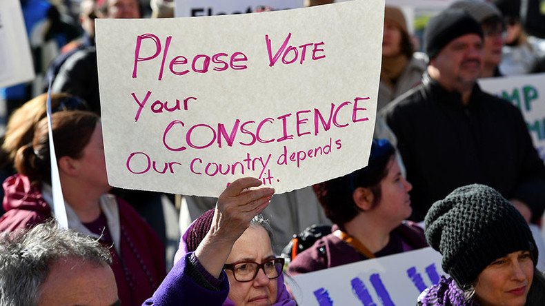 Trump wins Electoral College vote amid protests (VIDEO)