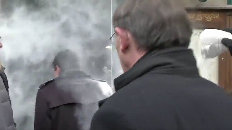 Flour power: French presidential candidate Manuel Valls attacked outside cafe (VIDEO)