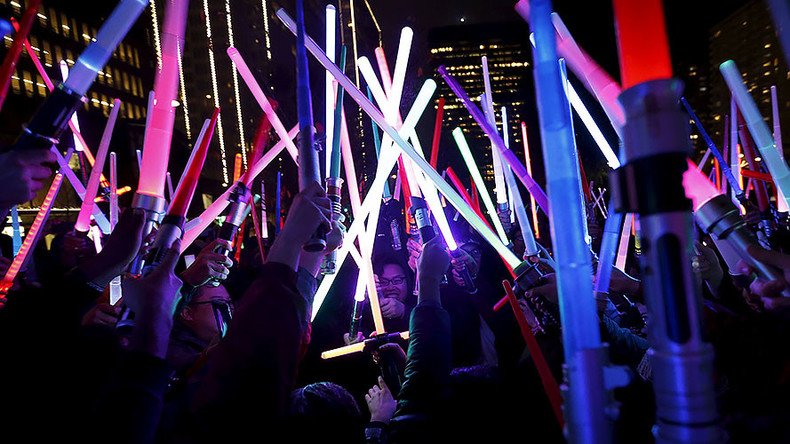 Star Wars fans honor Carrie Fisher with lightsaber vigils
