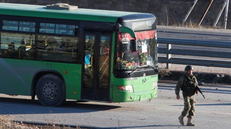 Dozens of buses evacuate 3,000 people from Aleppo's last rebel-held district