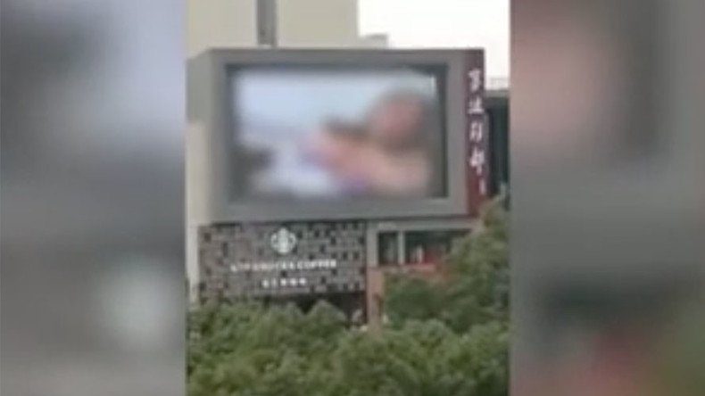 NSFW shopping: Graphic porn played on Chinese mall billboard