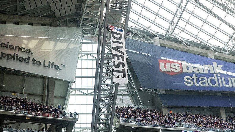 DAPL activists make daring protest during NFL game (PHOTOS, VIDEO)