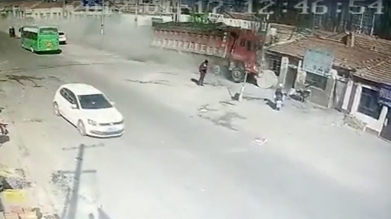 Dramatic CCTV footage shows moment speeding truck crashes into row of houses, killing 5