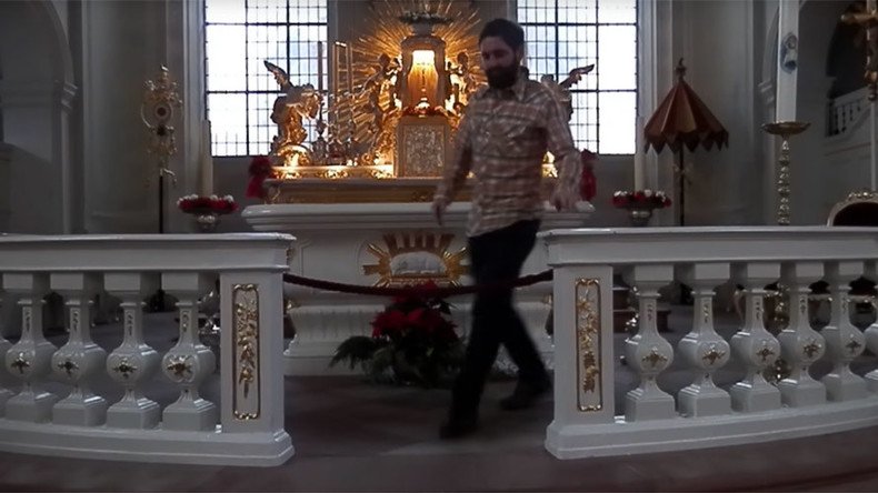 Artist fined €700 for 27 push-ups on Catholic Church altar (VIDEO)